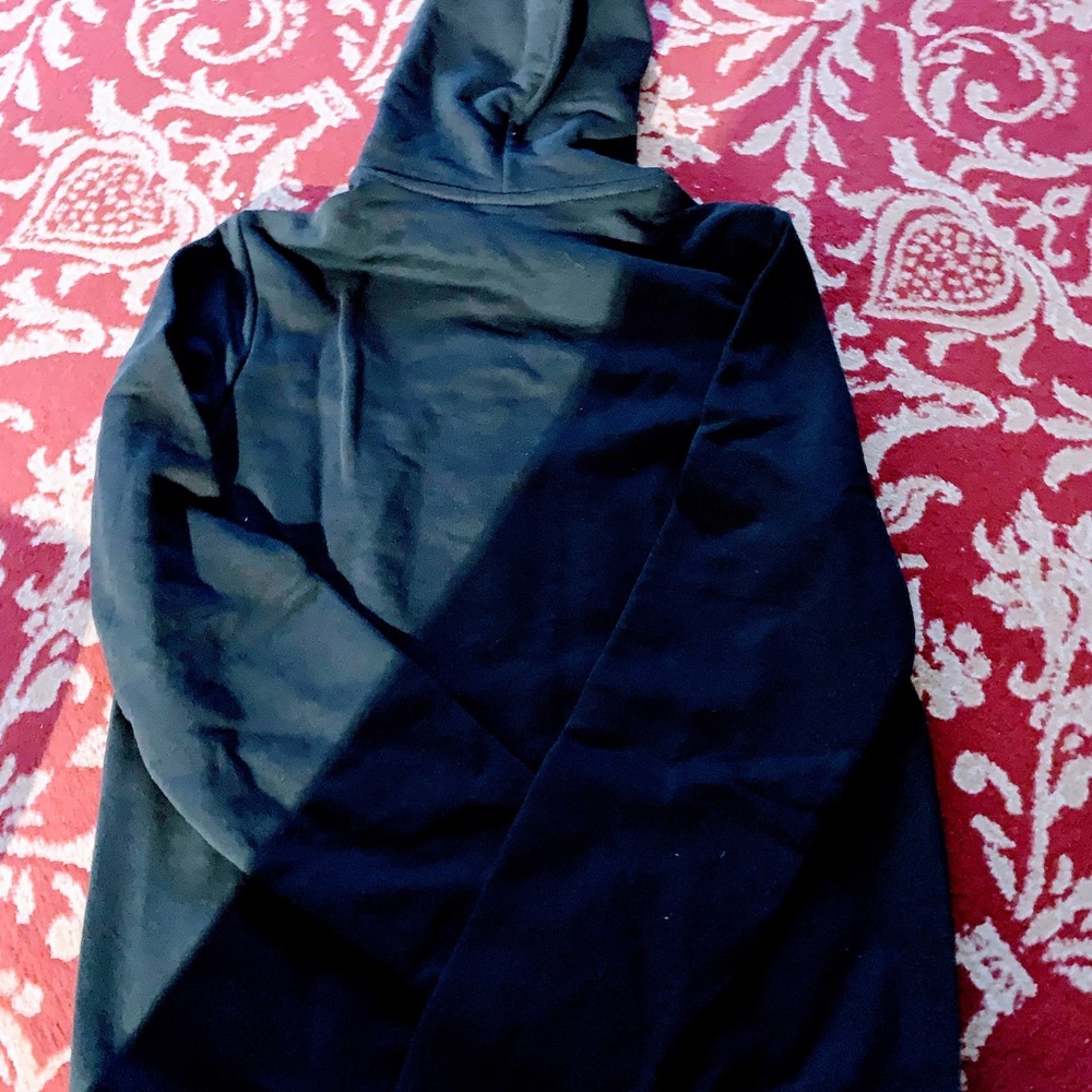 Reebok new size small men black with white lettering